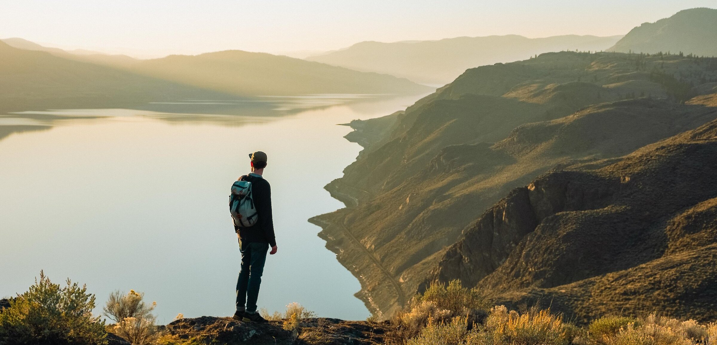 Hiker overlooking Kamloops Lake