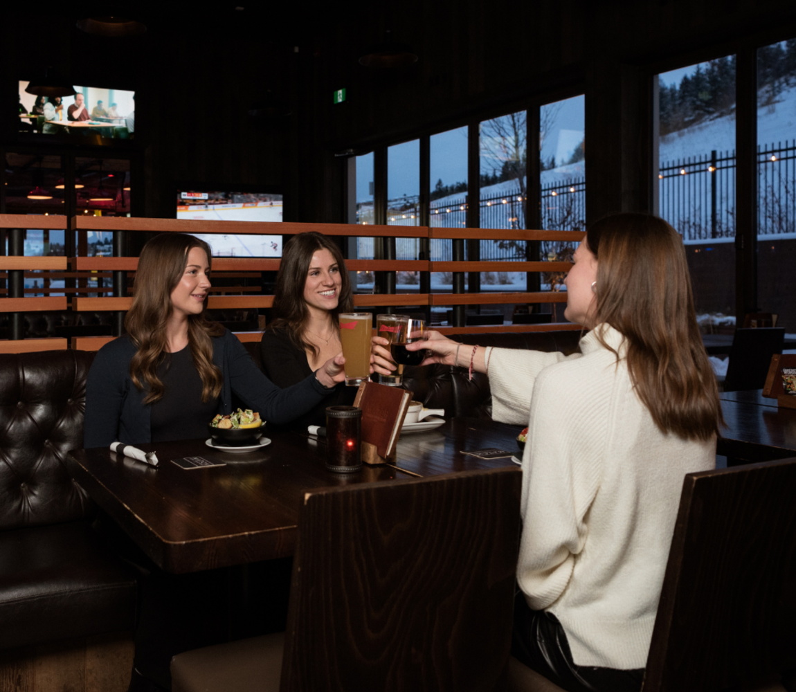 Three Women at eating a MATCH Public House and Eatery in Kamloops, BC.
