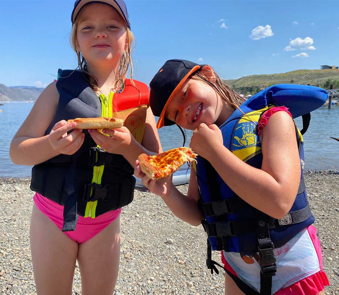 Family enjoying pizza at Bruker Marina
