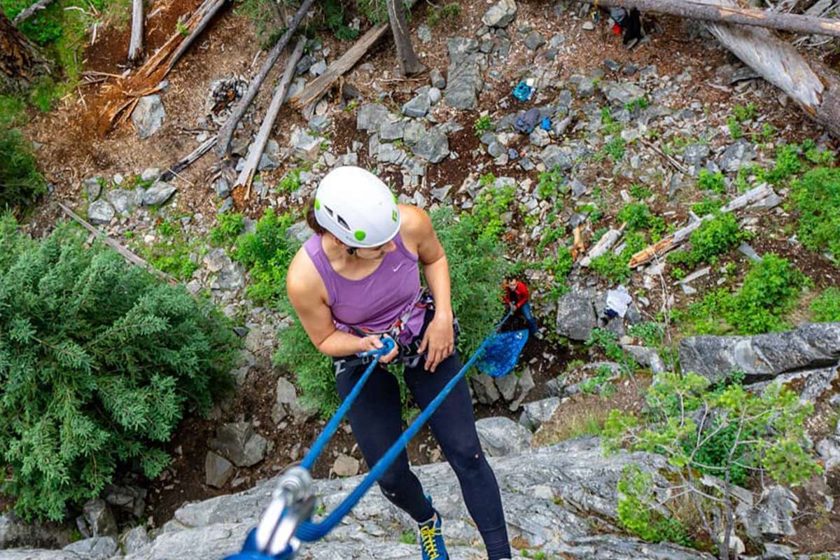 girl climbing roche lake