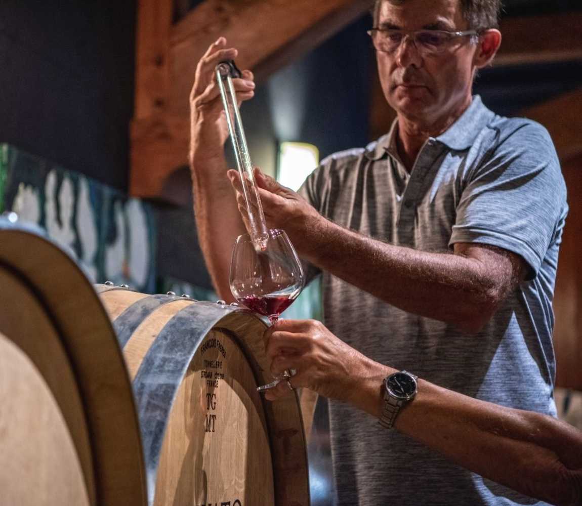 Winemaker and owner, John Woodward, testing wine at Privato Vineyard + Winery