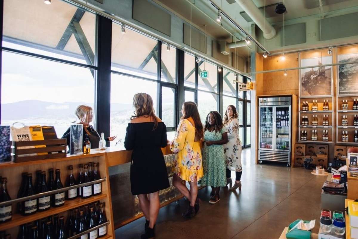 Group of girls wine tasting in the tasting room at Monte Creek Winery