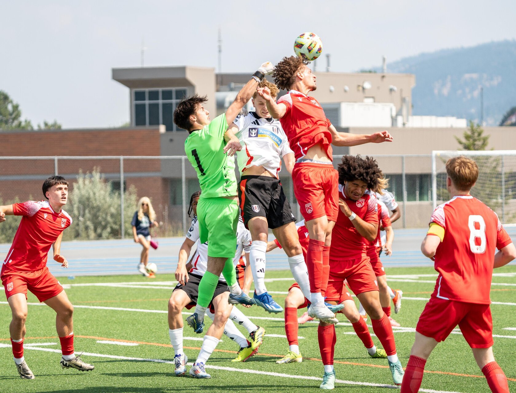 Player heads the soccer ball during the Kamloops International Cup.