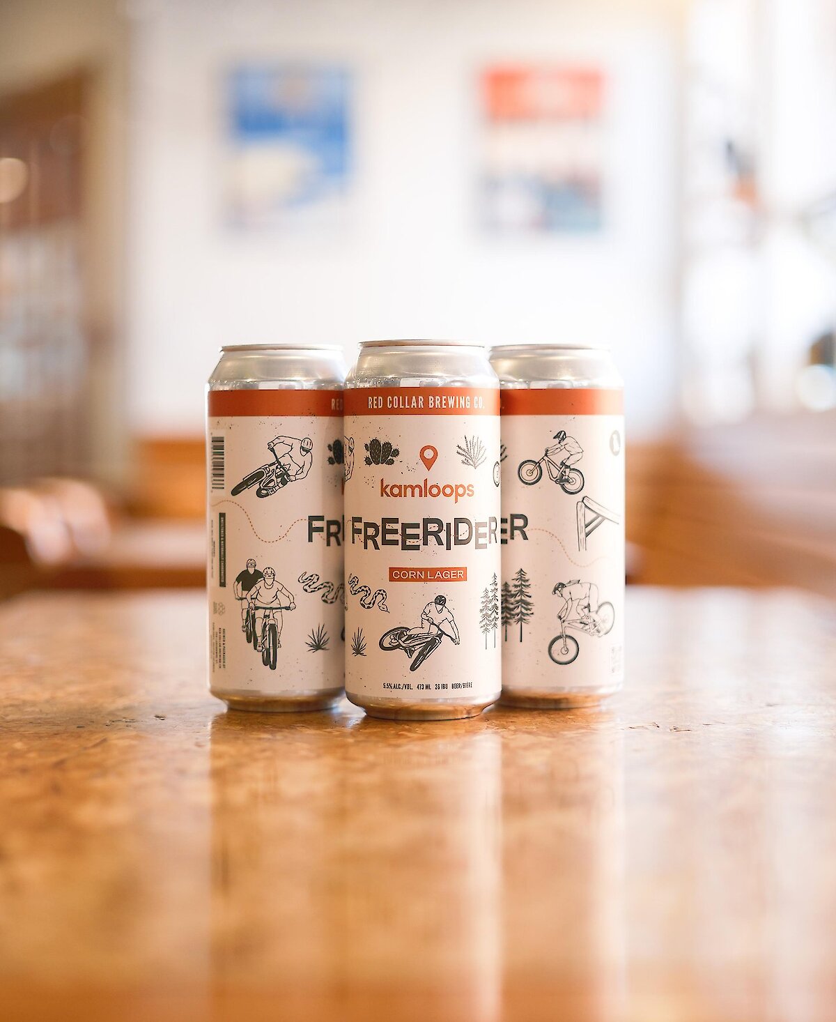 Pint of Room to Roam White IPA with a can beside it in the Red Collar Brewing Taproom located in Kamloops, BC.