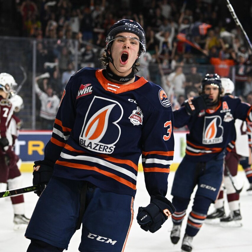 A Kamloops Blazers player celebrates a goal as teammates and fans cheer at the Sandman Centre in Kamloops, BC