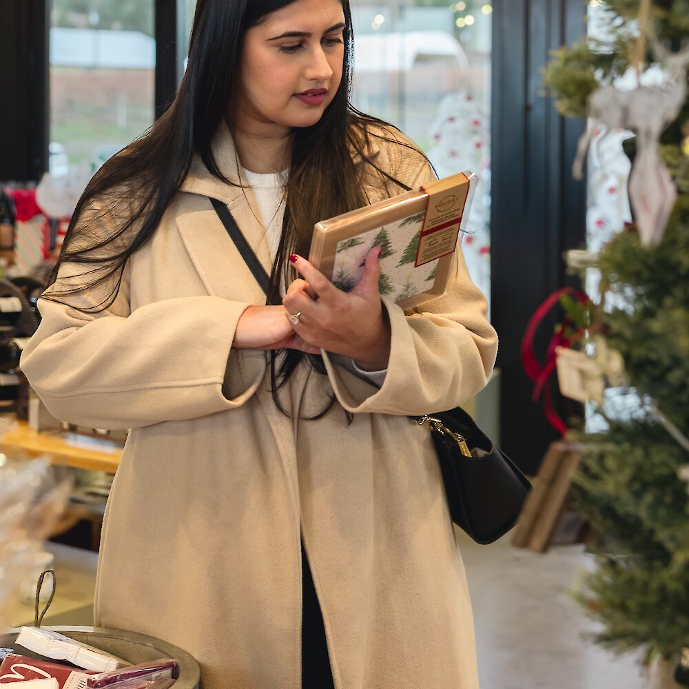 Couple smiling as they enjoy their wine tasting at Monte Creek Winery located near Kamloops, British Columbia.