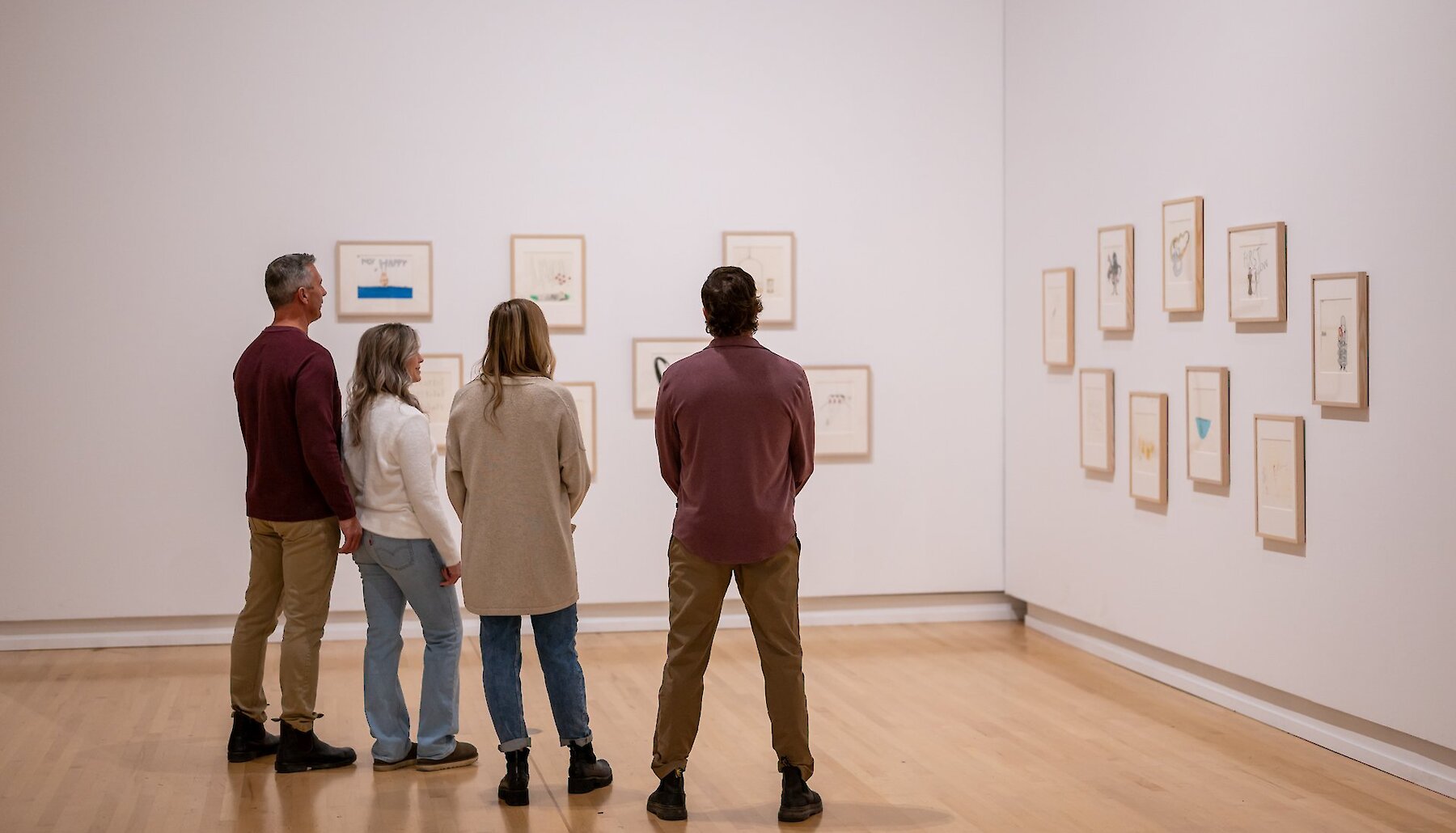A group of people view the show at the Kamloops Art Gallery