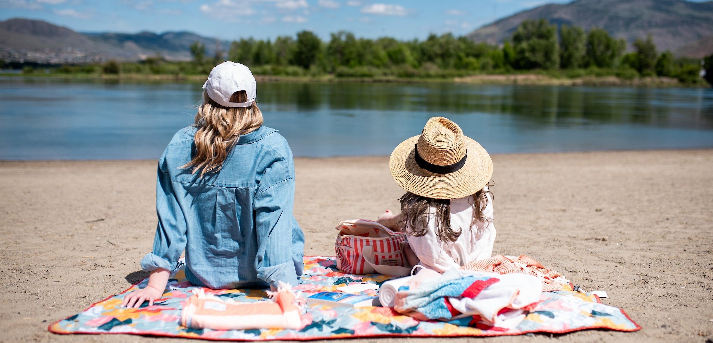 2 women at Riverside park beach overlooking the Thompson River