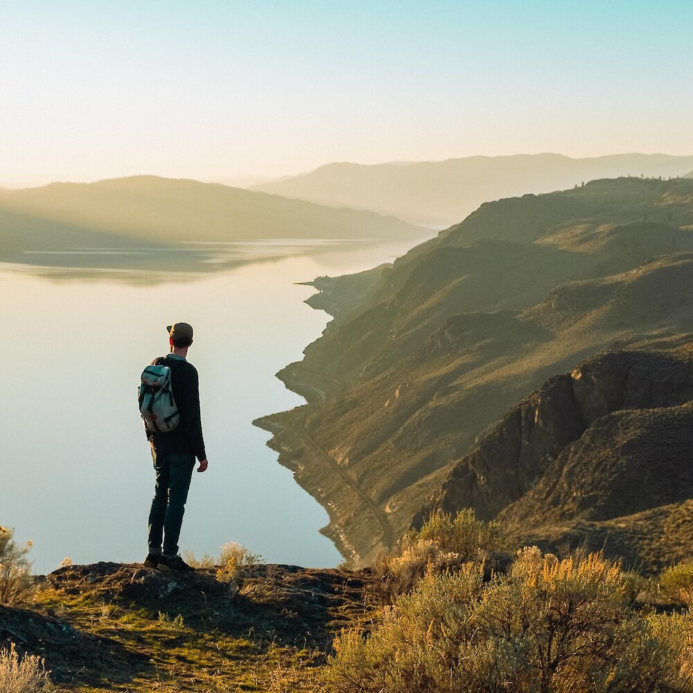 Hiker overlooking Kamloops Lake