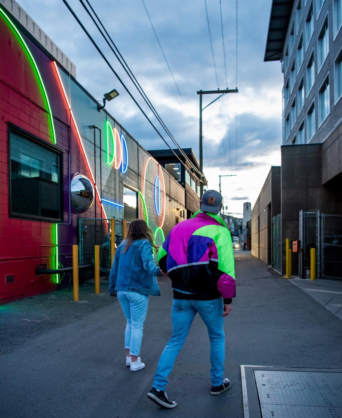 A couple walking down Electric Alley an illuminate Kamloops Activation of a light up alley behind the Delta Hotel in downtown Kamloops, BC.