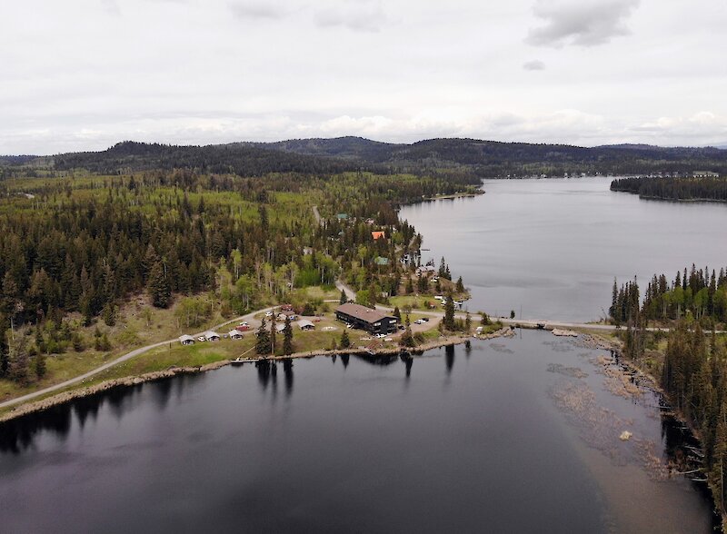 Aerial view of Lac Le Jeune, a calm, forest-lined lake just outside Kamloops known for its easy access and reliable rainbow trout fishing.