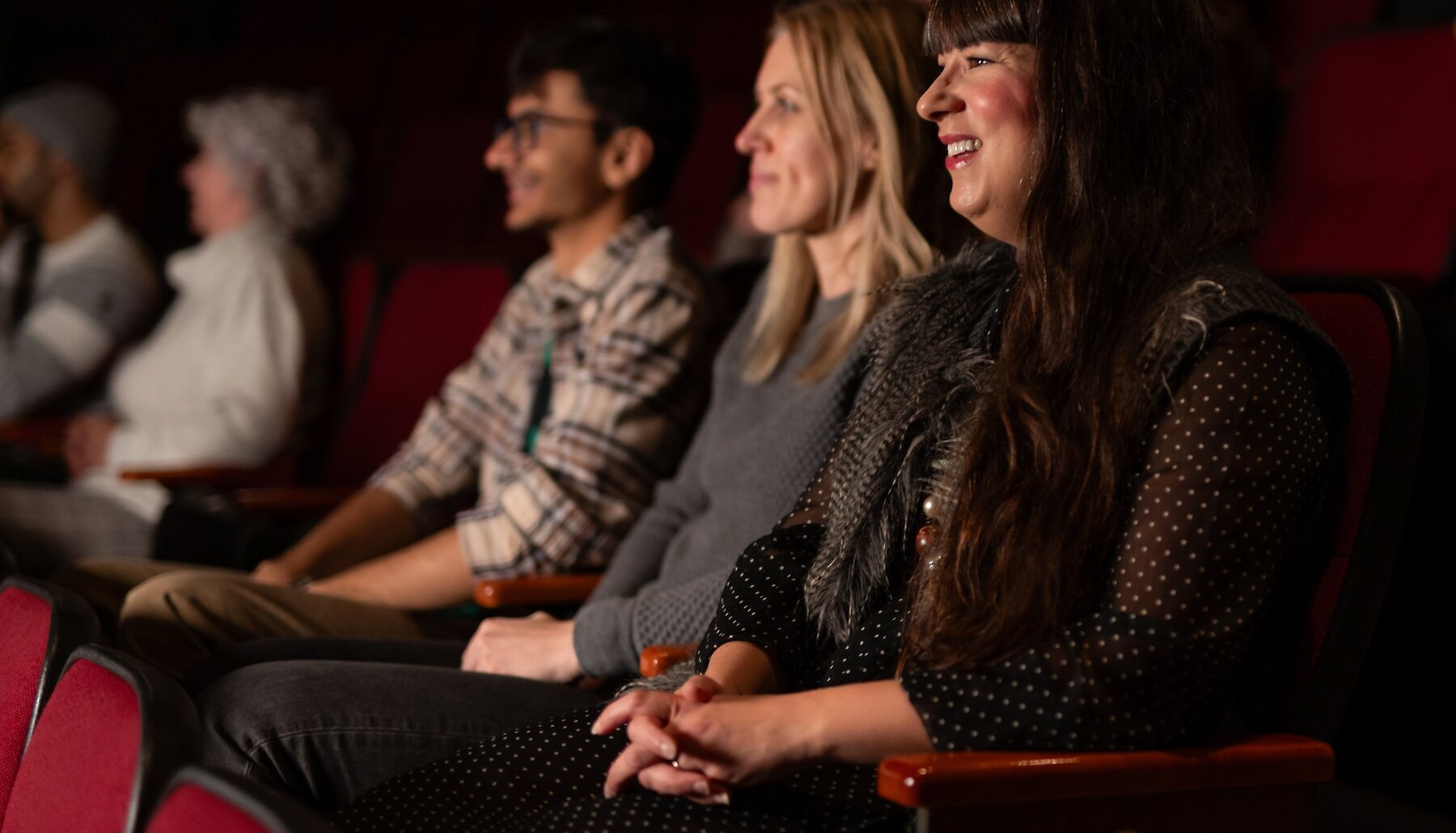 Crowd laughing during a live comedy show in Kamloops.